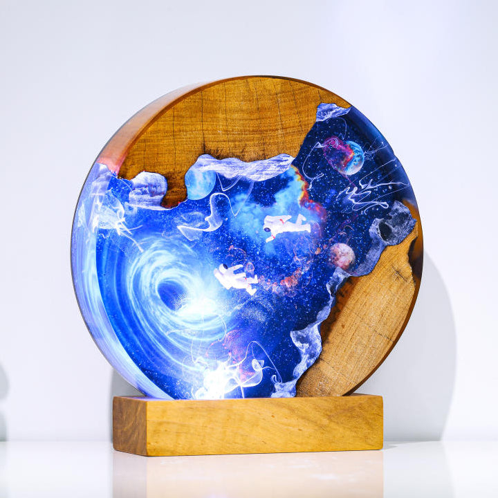 Interstellar Astronaut entering into the Black hole Night Light