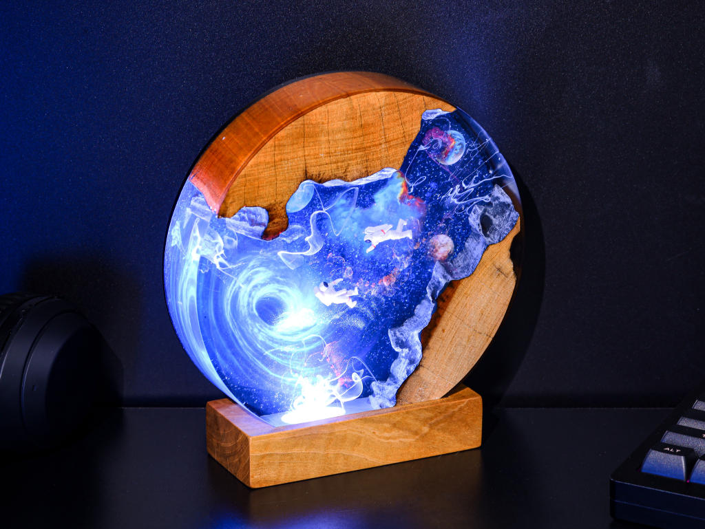 Interstellar Astronaut entering into the Black hole Night Light
