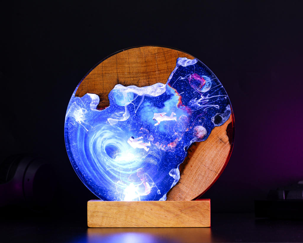 Interstellar Astronaut entering into the Black hole Night Light