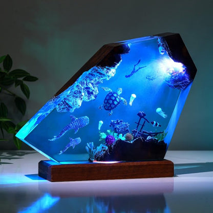 Orca and divers night light