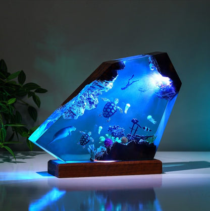 Orca and divers night light