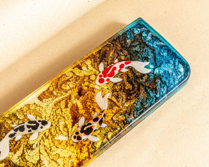 Yellow koi resin wrist rest